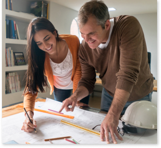 couple looking at house plans